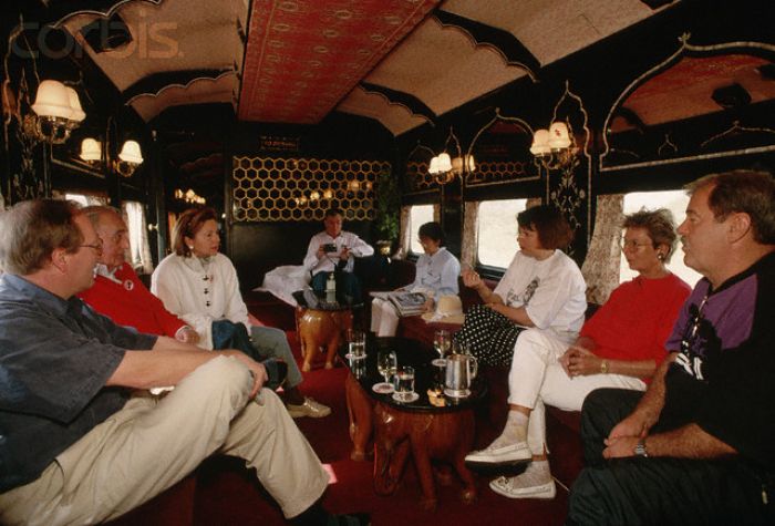 Guests relaxing in the lounge on board the alace on Wheels