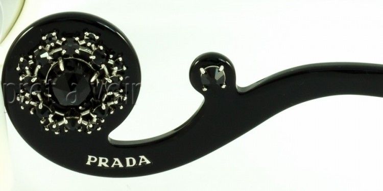 The Prada 'scroll' design with inlaid jewel design