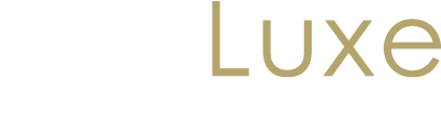 JustLuxe logo celebrating 20 years of luxury, designed for a dark header template.