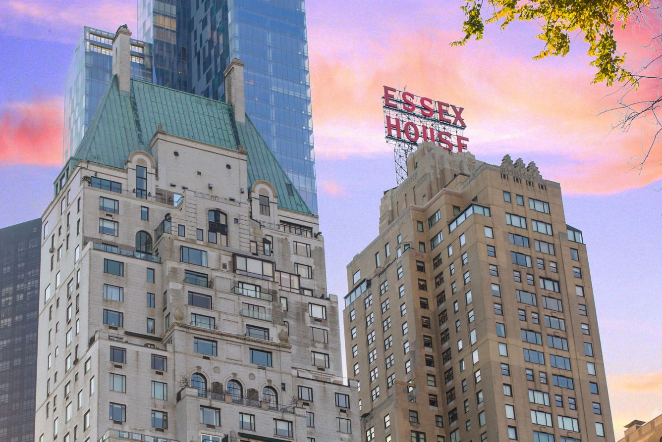 Essex House sign atop a historic building, surrounded by modern skyscrapers and a colorful sky in New York City.
