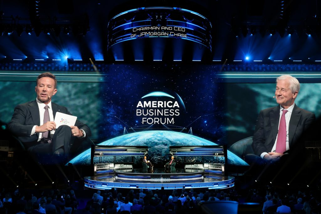 Panel discussion at the America Business Forum in Miami, featuring prominent figures from sports, business, and politics.