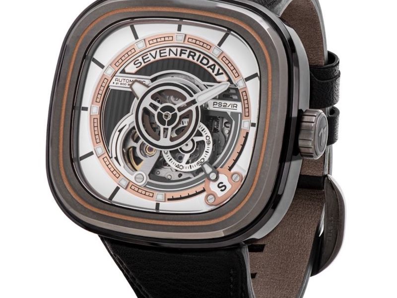 SEVENFRIDAY PS2/03 "BC" watch featuring a unique square design, intricate dial details, and a black leather strap.