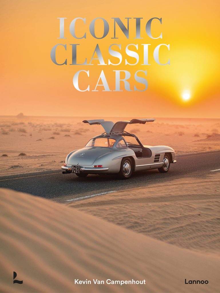 Classic car on a desert road at sunset with "Iconic Classic Cars" title prominently displayed.