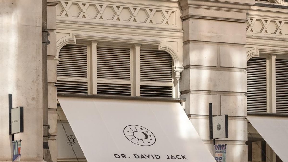 Exterior view of Dr. David Jack City Clinic with large windows and awnings, showcasing a welcoming atmosphere.
