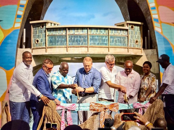 Officials gather to celebrate the opening of Royal Caribbean's all-inclusive Royal Beach Club on Paradise Island.