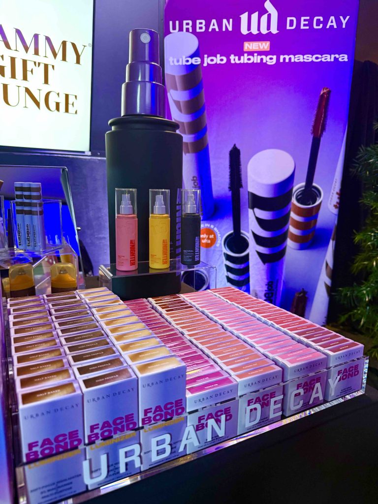 Display of Urban Decay cosmetics including mascara and lip products at the 2026 Grammy Awards Gift Lounge.