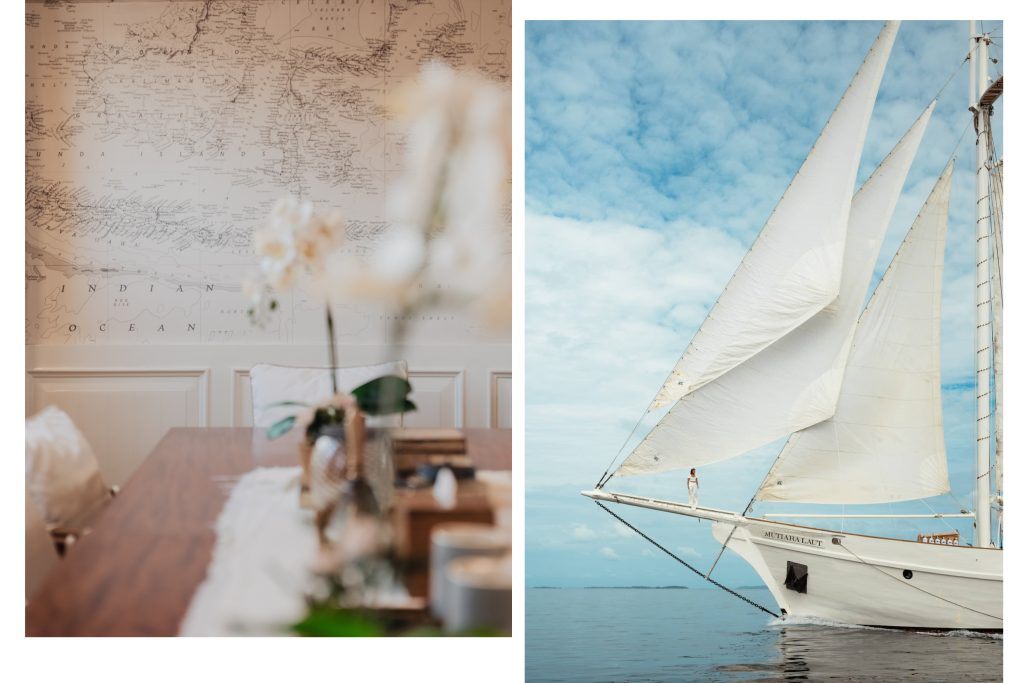 Luxury sailing yacht with billowing sails on calm waters, showcasing elegance in exploring Indonesia’s hidden islands.