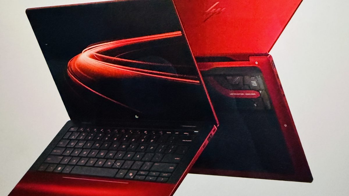 Luxury HP limited edition Scuderia Ferrari AI PC in vibrant red with an open display showing sleek design and keyboard.