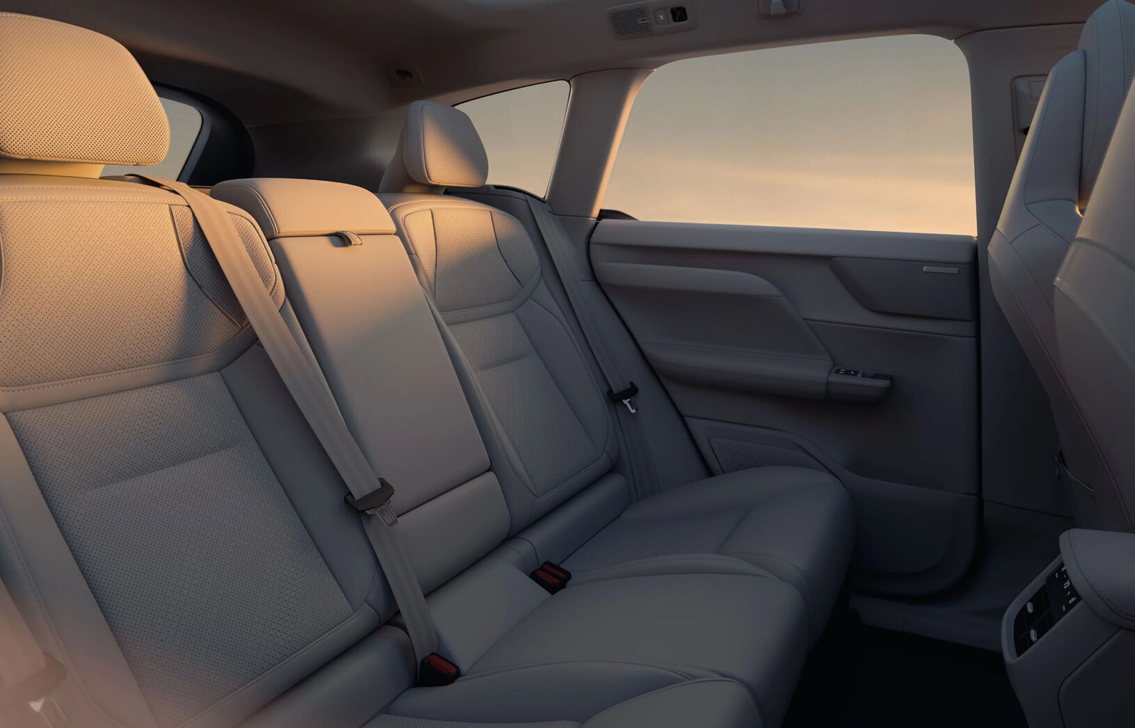 Spacious rear seats of the Volvo EX60 featuring premium materials and a sleek design, perfect for comfortable journeys.