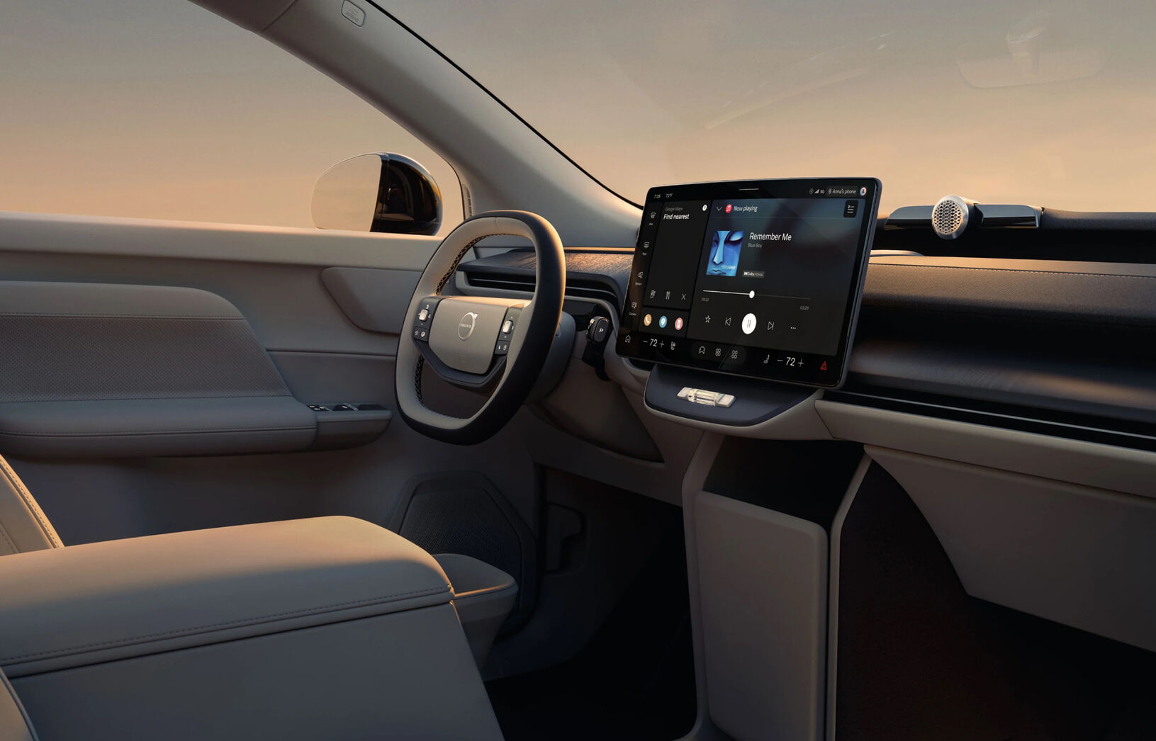 Volvo EX60 interior showcasing a modern dashboard, touchscreen display, and steering wheel in an elegant setting.
