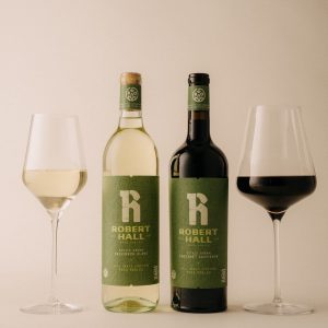 Regenerative Organic Certified wines featuring a white Sauvignon Blanc and a red Cabernet Sauvignon from Robert Hall Vineyards.