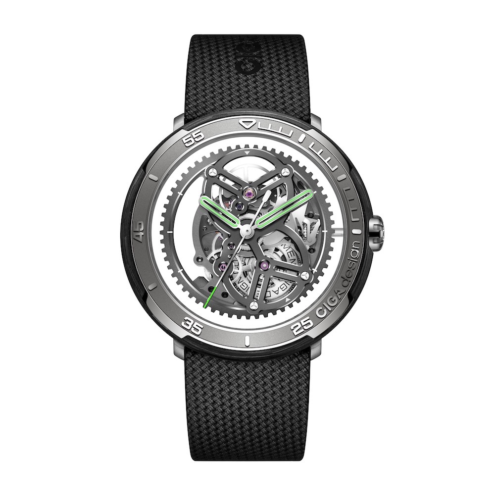 CIGA Design Vector watch features a transparent dial showcasing intricate mechanics and a black textured strap.