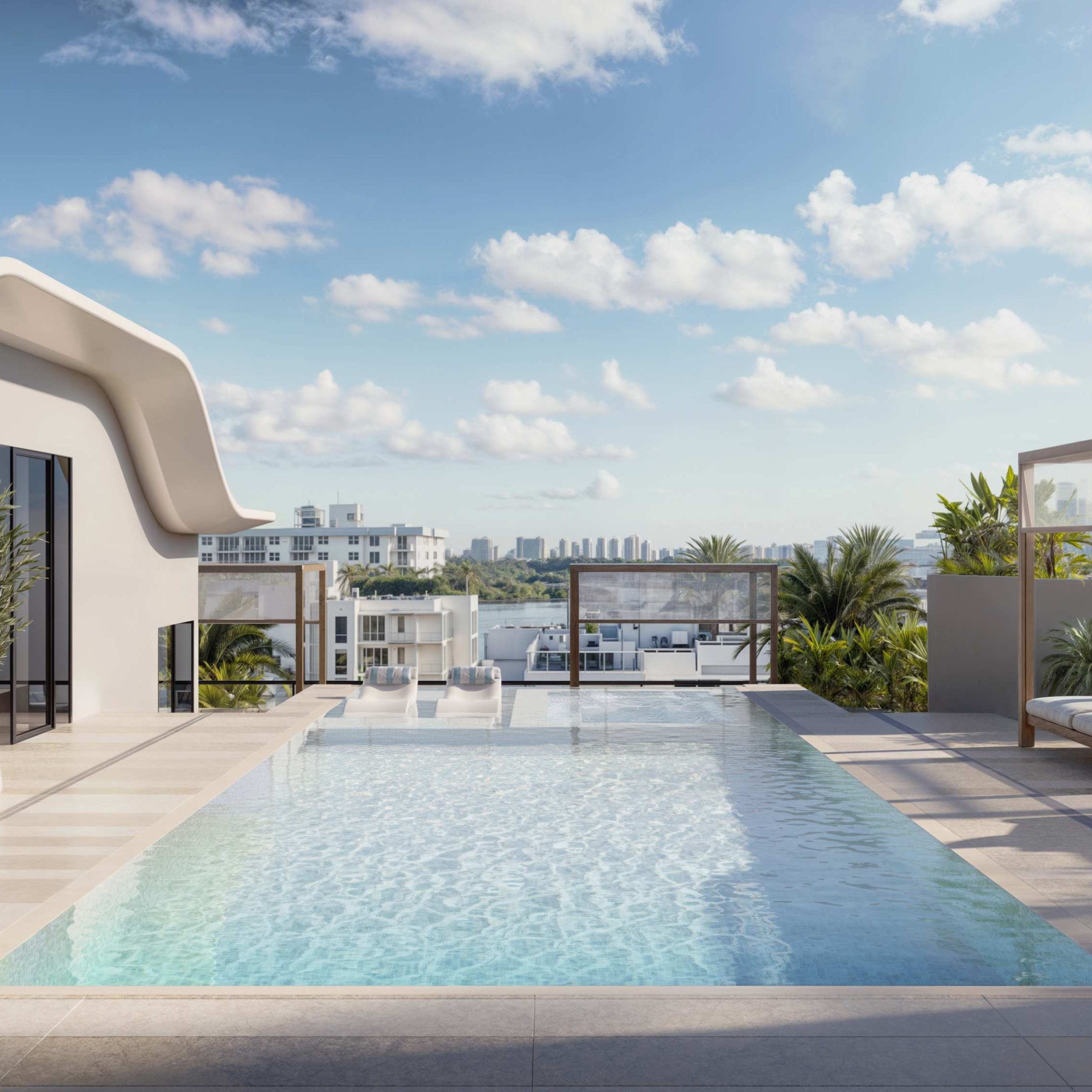 Rooftop pool with modern architecture, lounging areas, and vibrant greenery overlooking Bay Harbor Islands.