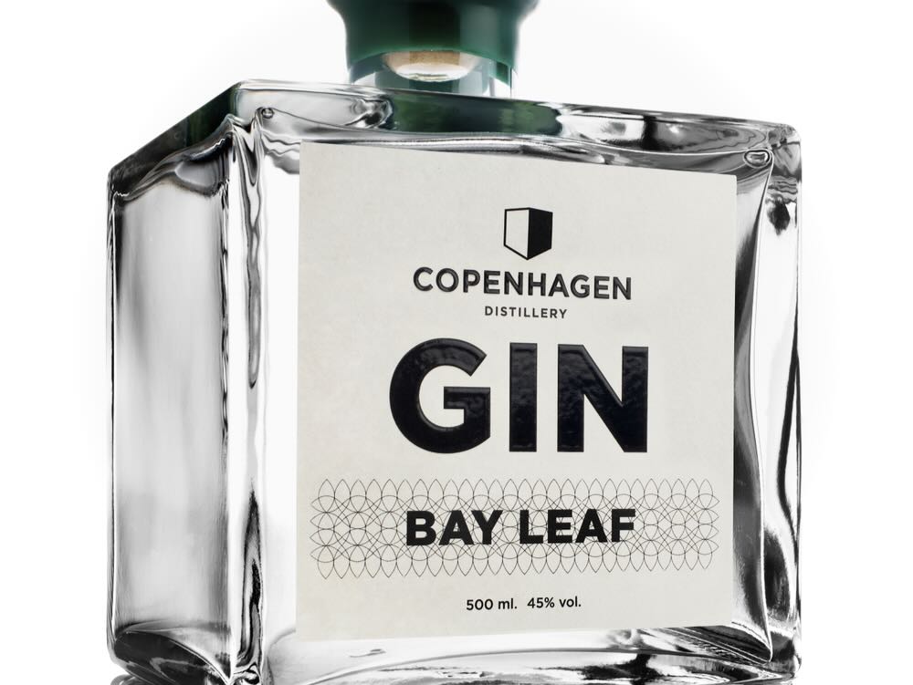 Copenhagen Distillery Bay Leaf Gin bottle, featuring a modern design and 500 ml volume, for World Gin Day celebrations.