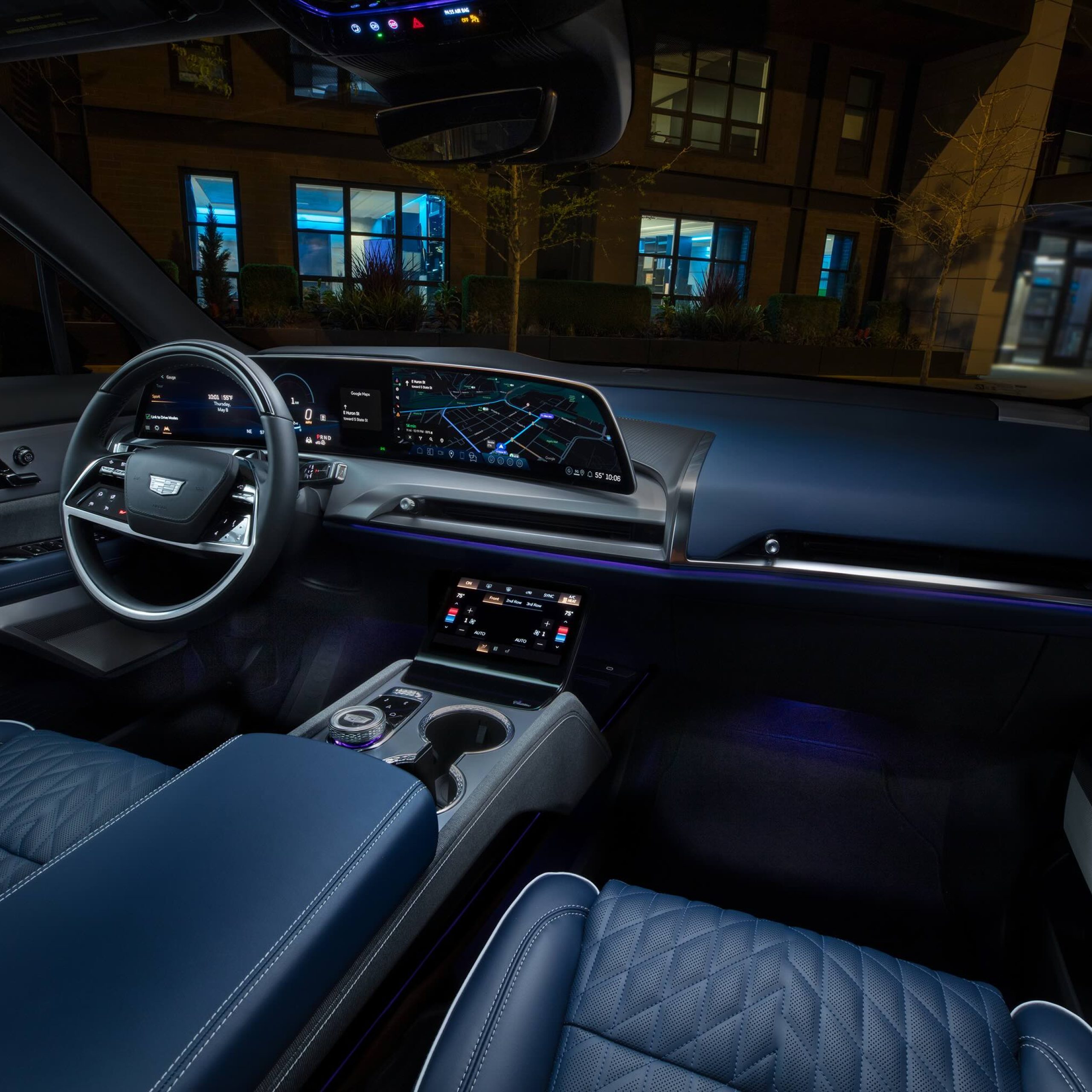 Luxurious interior of the 2026 Cadillac VISTIQ featuring modern controls, premium materials, and ambient lighting.