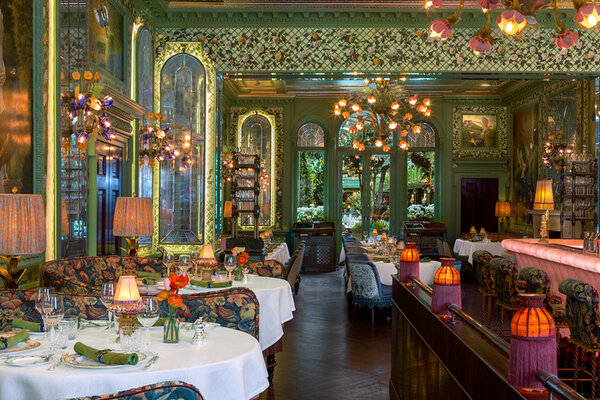 Luxurious restaurant interior featuring elegant decor, soft lighting, and floral arrangements, capturing timeless elegance.