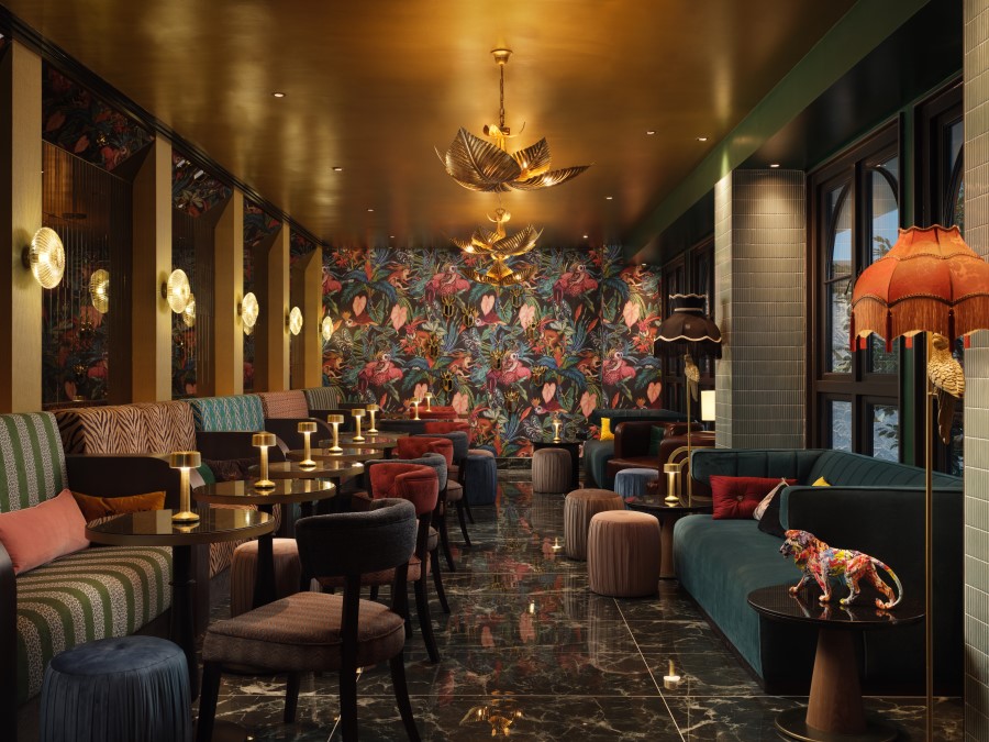 Luxurious cocktail bar featuring vibrant floral wallpaper, eclectic seating, and stylish lighting, perfect for a chic night out.