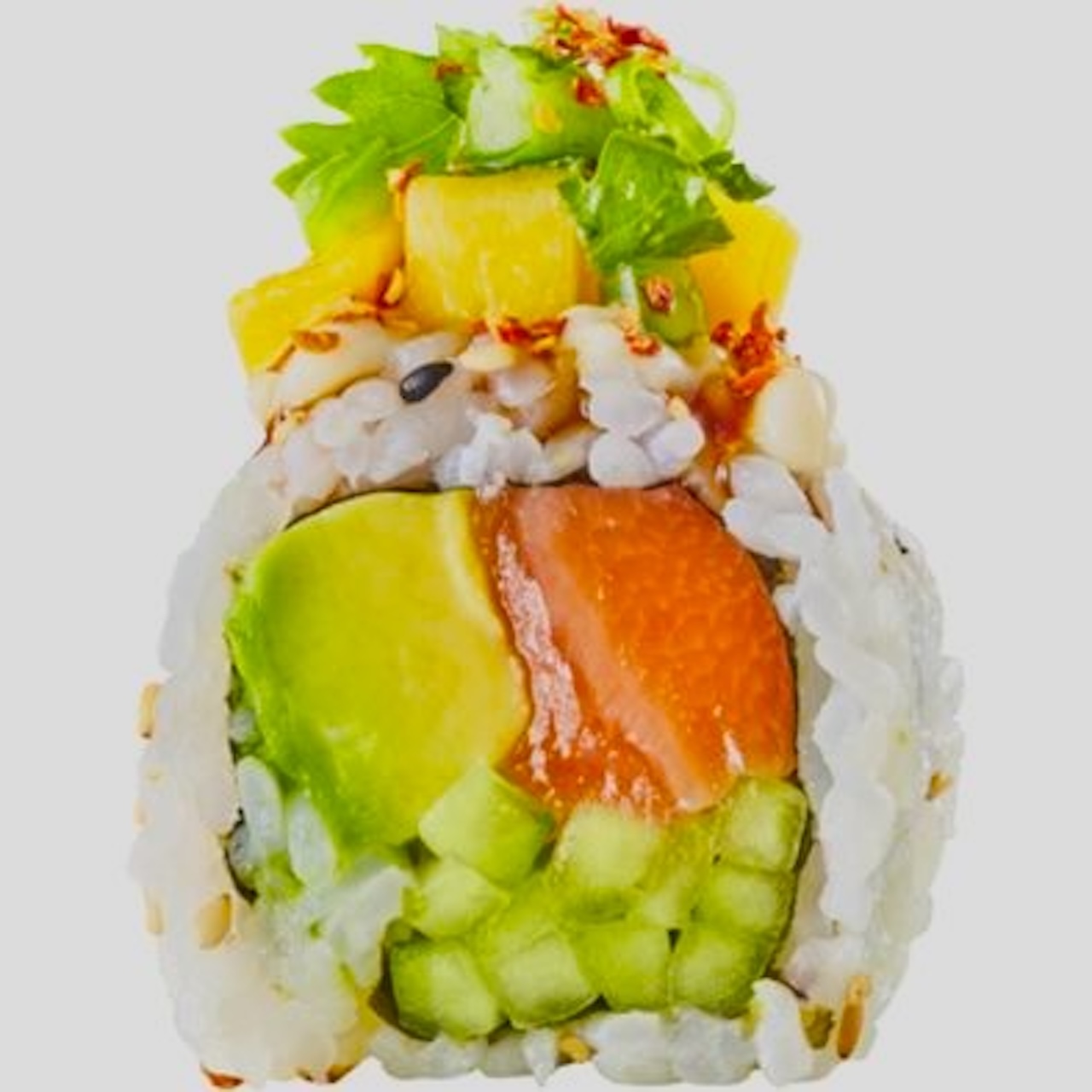 Colorful sushi roll with layers of avocado, salmon, cucumber, and topped with chopped greens and pineapple. Perfect for sushi lovers.