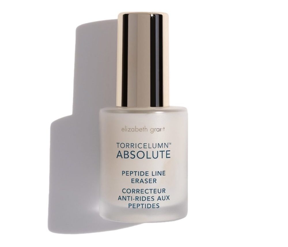 Peptide line eraser serum in a glass bottle with a gold cap, designed to reduce the appearance of fine lines.