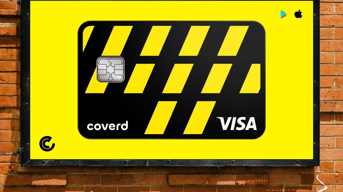 Credit card design featuring a black and yellow theme, displaying the coverd brand and Visa logo on a brick wall backdrop.