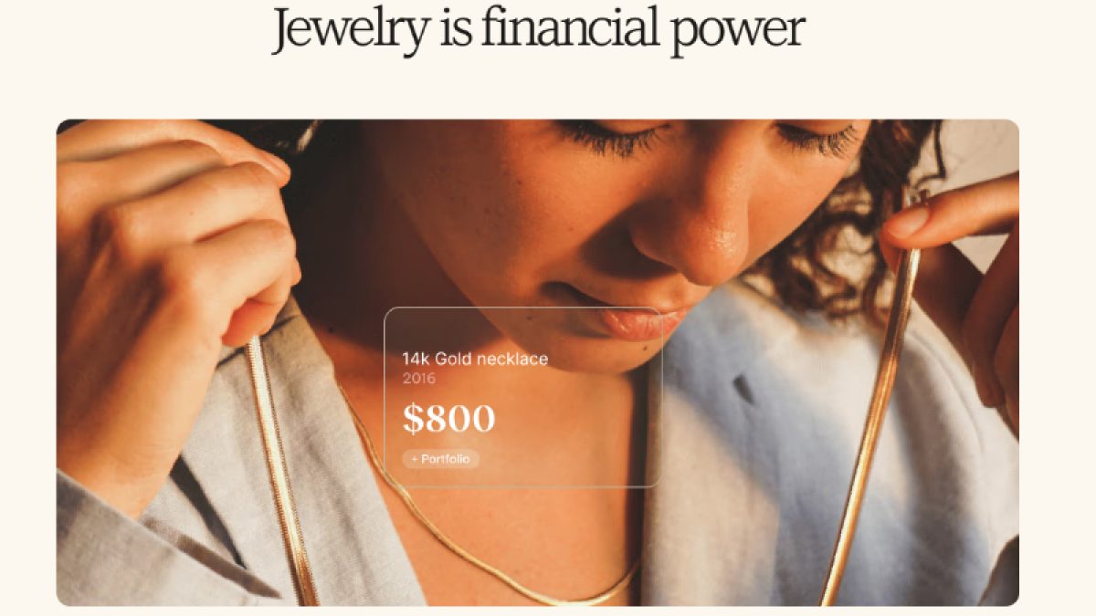 A woman examines a 14k gold necklace, showcasing its value and potential as a source of working capital.