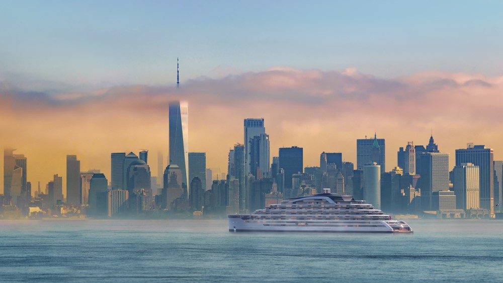 A modern cruise ship sails past the New York City skyline at sunrise, shrouded in soft mist and golden light.