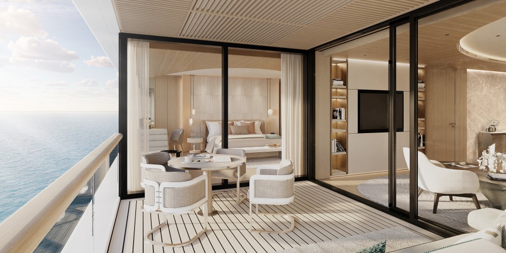 Luxurious balcony with seating and a stunning ocean view, showcasing modern interior design and spacious living areas.