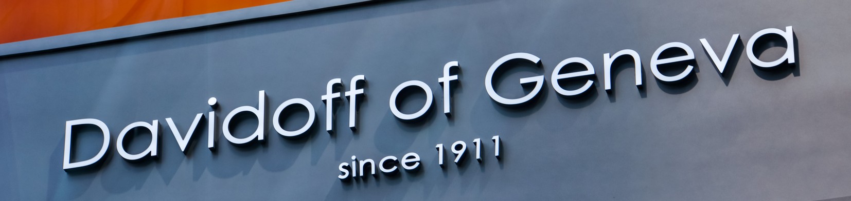 Davidoff of Geneva sign showcasing the brand's established presence since 1911, highlighting luxury and premium cigars.