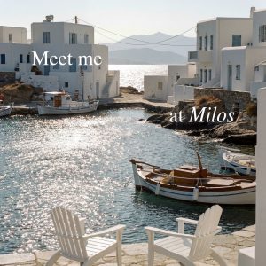 Chairs by a serene waterfront in Milos, with boats and white buildings reflecting a summer vibe.