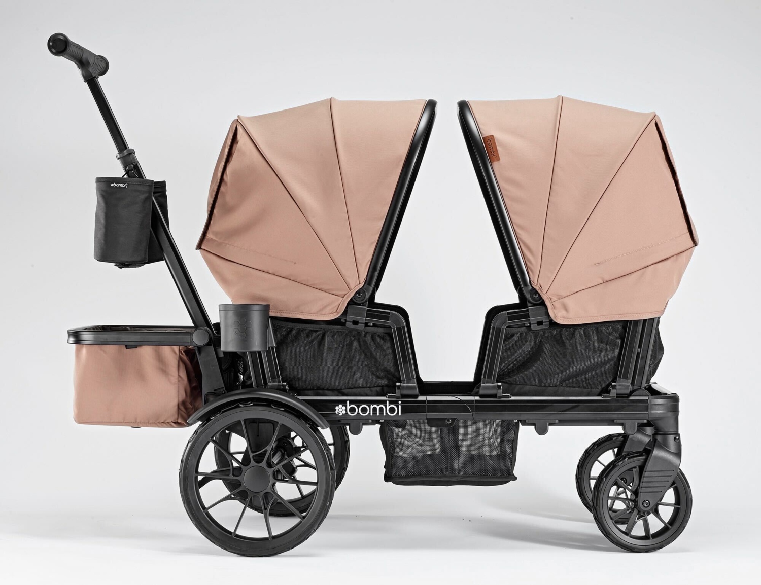 Double stroller with beige sunshades and a sleek black frame, ideal for luxury outings and weekend adventures.