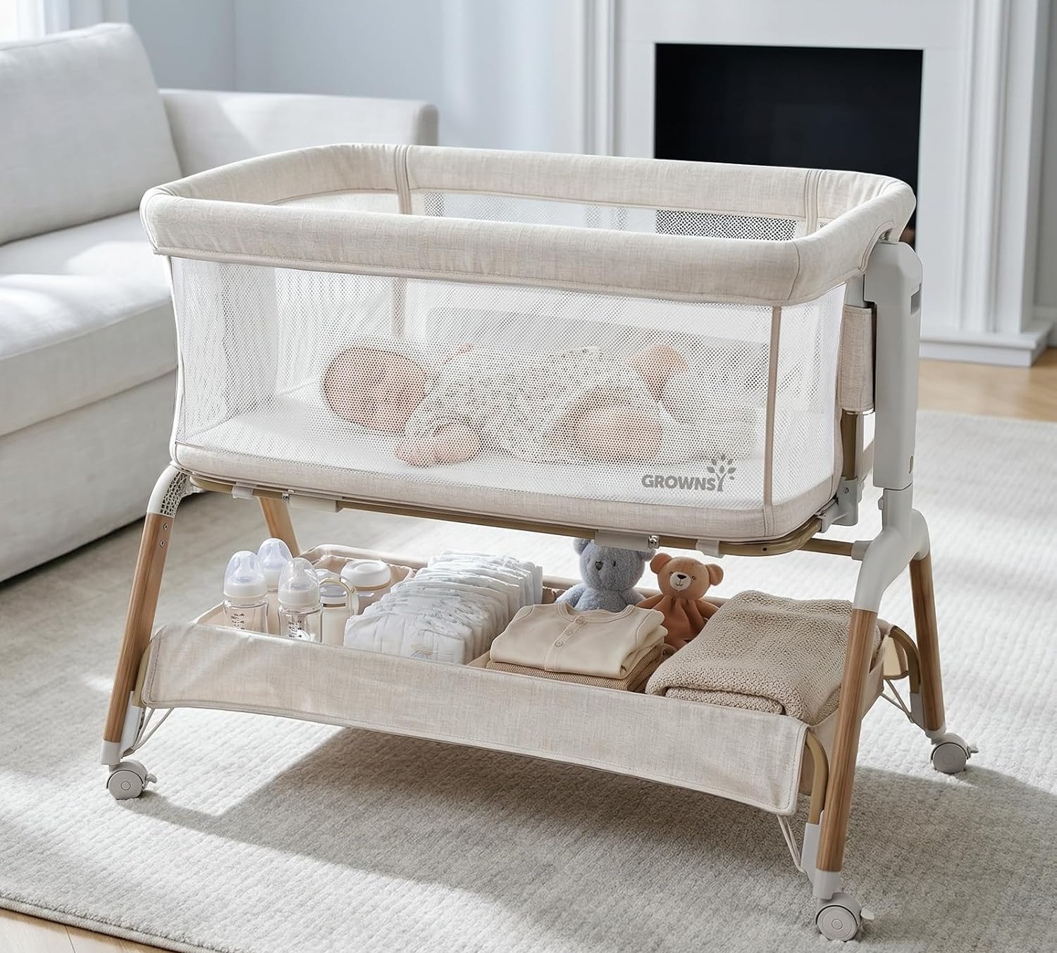 A cozy bassinet with a sleeping baby, featuring storage below with bottles and blankets, set in a bright living room.