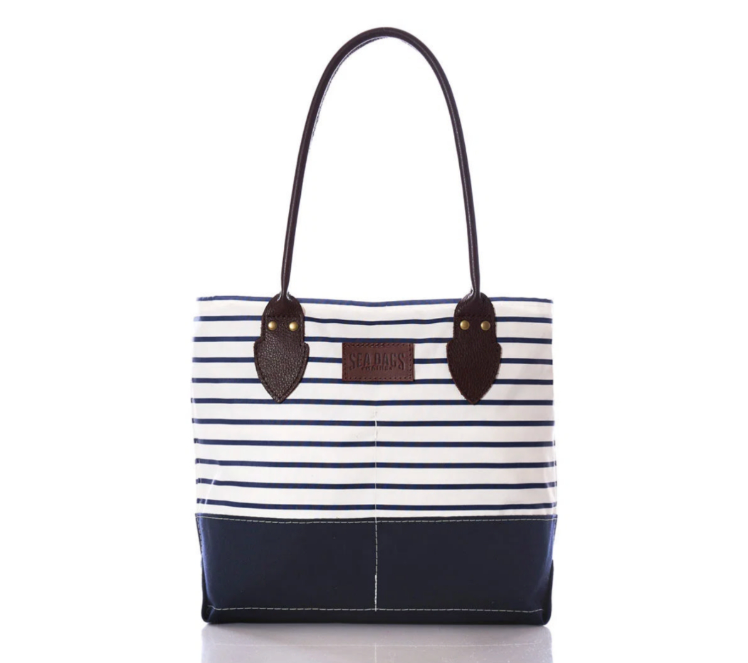 Canvas tote bag with navy stripes and leather accents, perfect for casual outings or beach trips.
