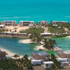 Waterfront luxury accommodations in South Bank, Turks & Caicos, with pristine waters and lush landscapes.
