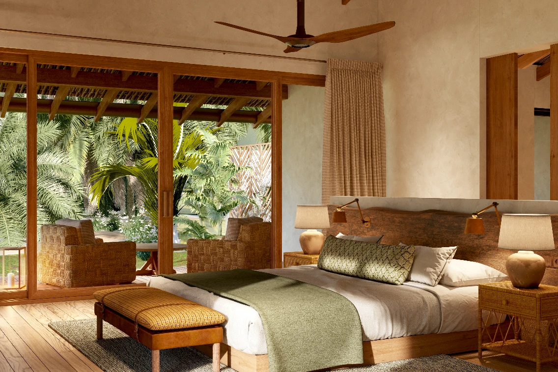 Modern bedroom featuring a king bed, tropical views, and bamboo furniture in a stylish resort setting.