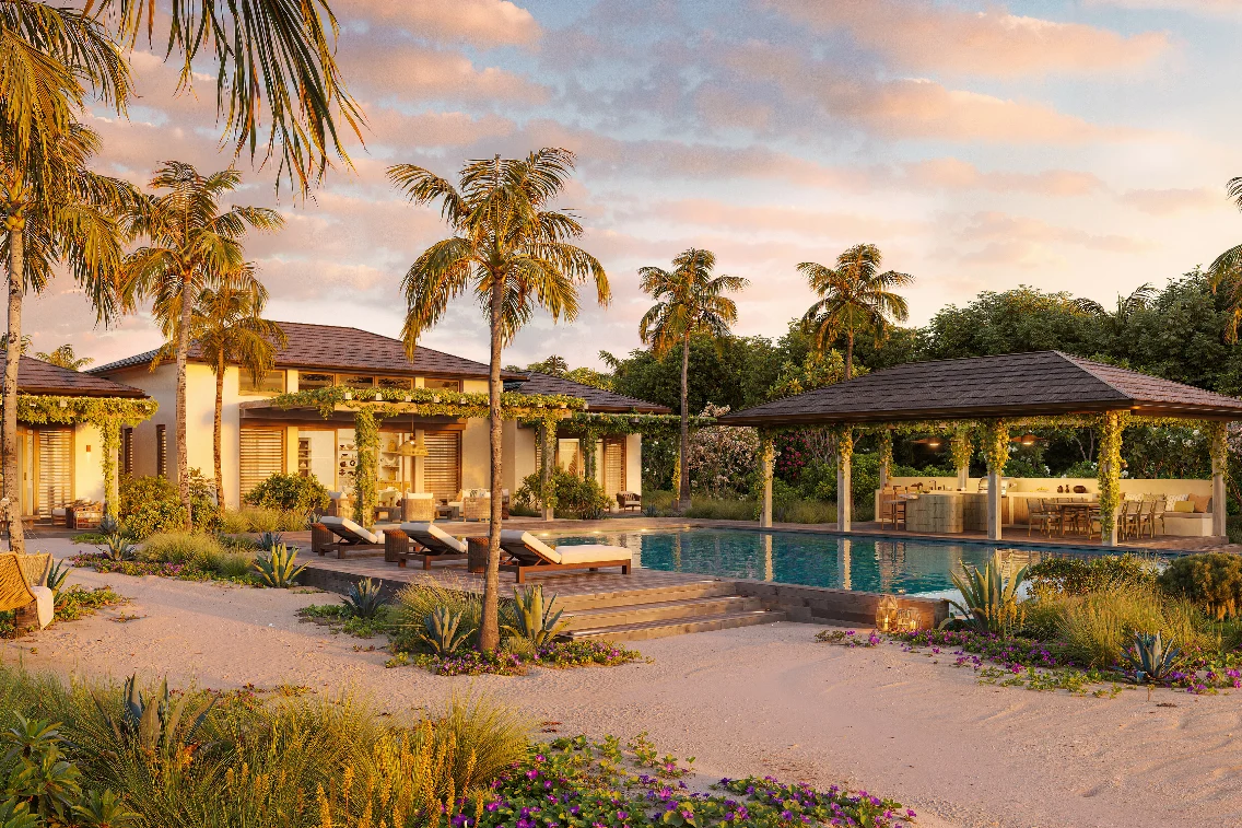 Luxury resort setting at Nobu Residences in Barbuda featuring a pool, lounging chairs, and tropical landscaping.