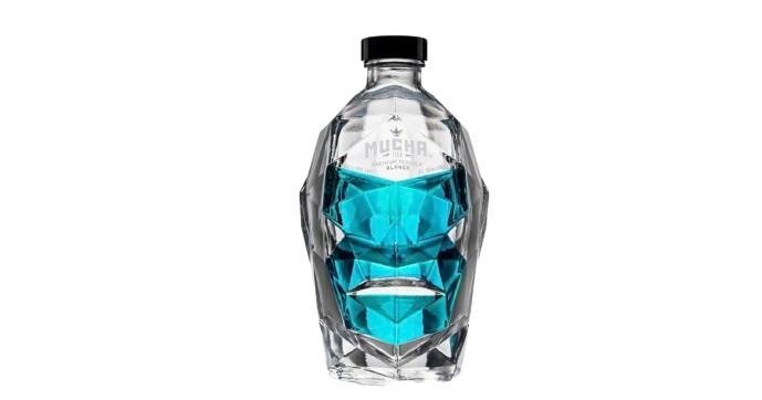Stylized tequila bottle with a geometric design and blue-tinted glass accents, showcasing a modern aesthetic.