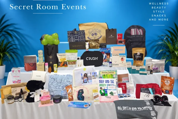 Gifting lounge display for the 2026 Celebrity Prime Time TV Nominees Secret Room Events featuring various wellness and beauty products.