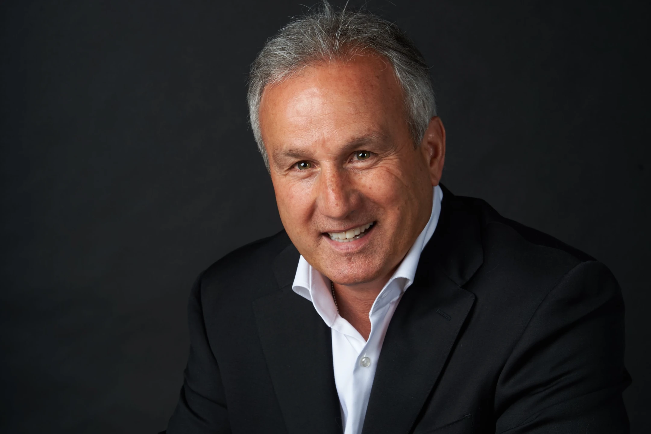 Paul Altieri, CEO of Bob's Watches, smiles while discussing the significance of the Rolex Padellone's return.
