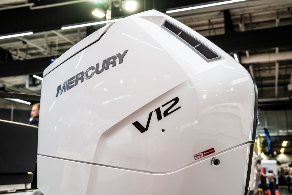 Mercury V12 outboard motor on display, showcasing its sleek design and modern technology for luxury motor yachts.