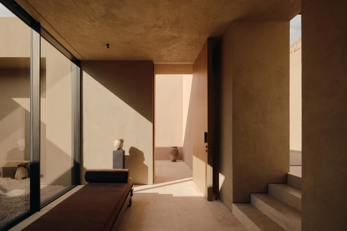 Interior view of a sculptural retreat in Southern Utah, featuring natural light, minimalist design, and earthy tones.