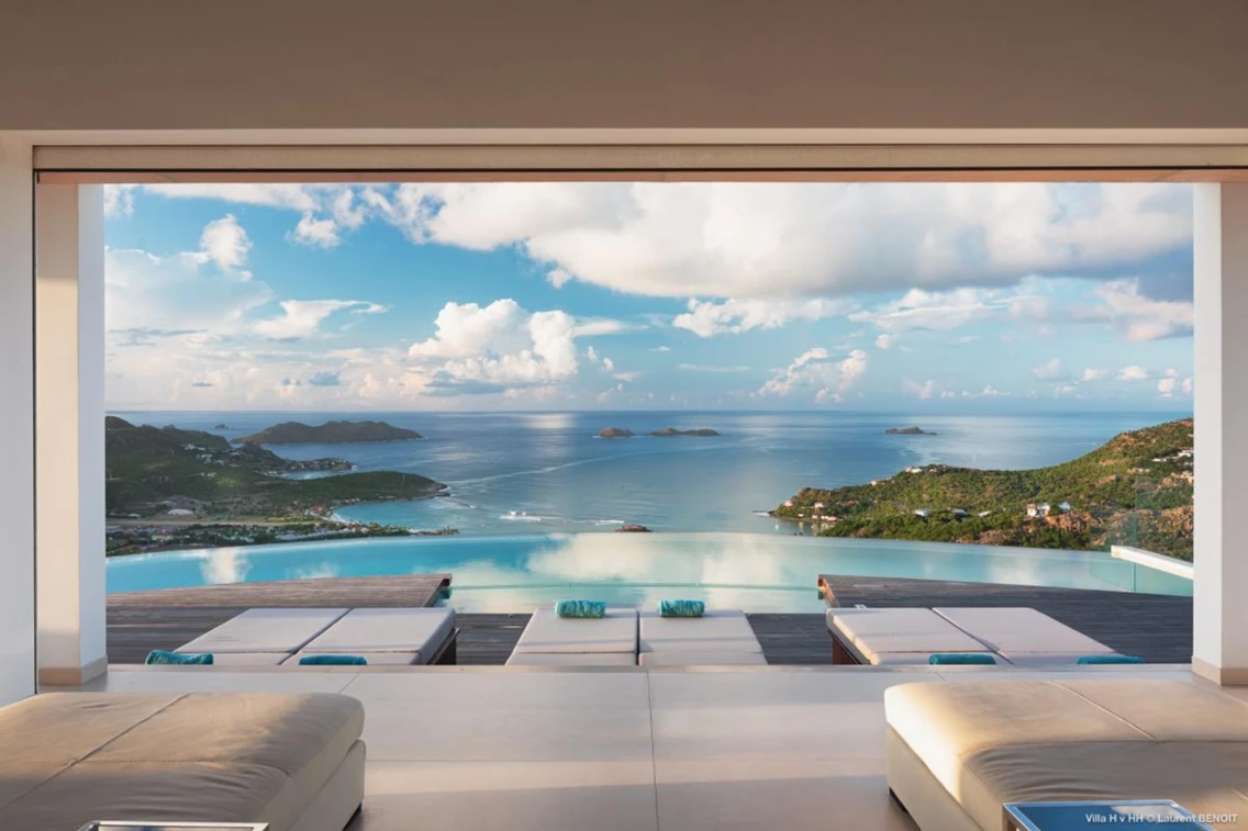 Luxury villa in St. Barts with expansive ocean view and infinity pool, showcasing a stunning Caribbean landscape.
