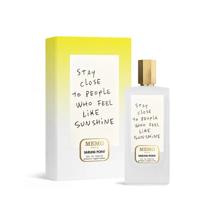 Darling Point perfume bottle next to its yellow and white box, featuring the quote "Stay close to people who feel like sunshine."
