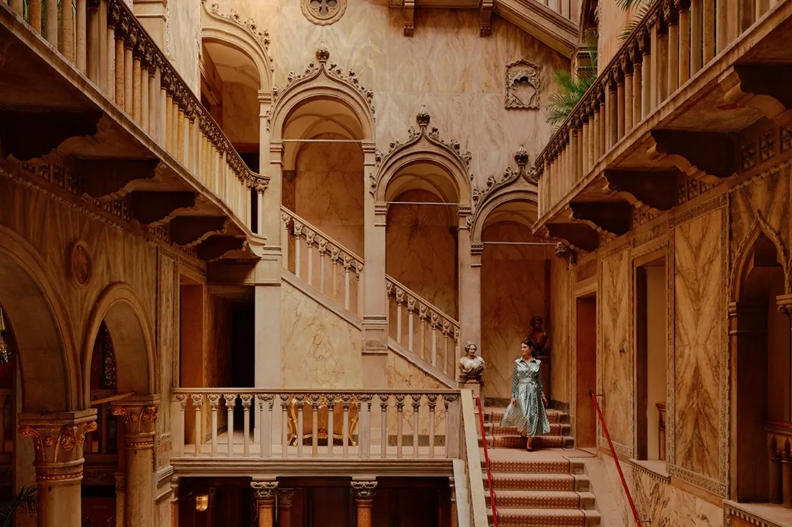 Elegant staircase and architectural details of a luxurious Venetian palazzo, highlighting its grandeur and design.