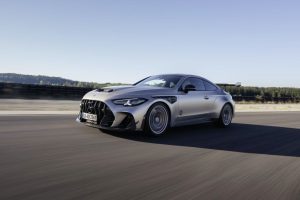Mercedes-AMG CLE 646 in a dynamic pose, showcasing its sleek design and aerodynamic features on a racing track.