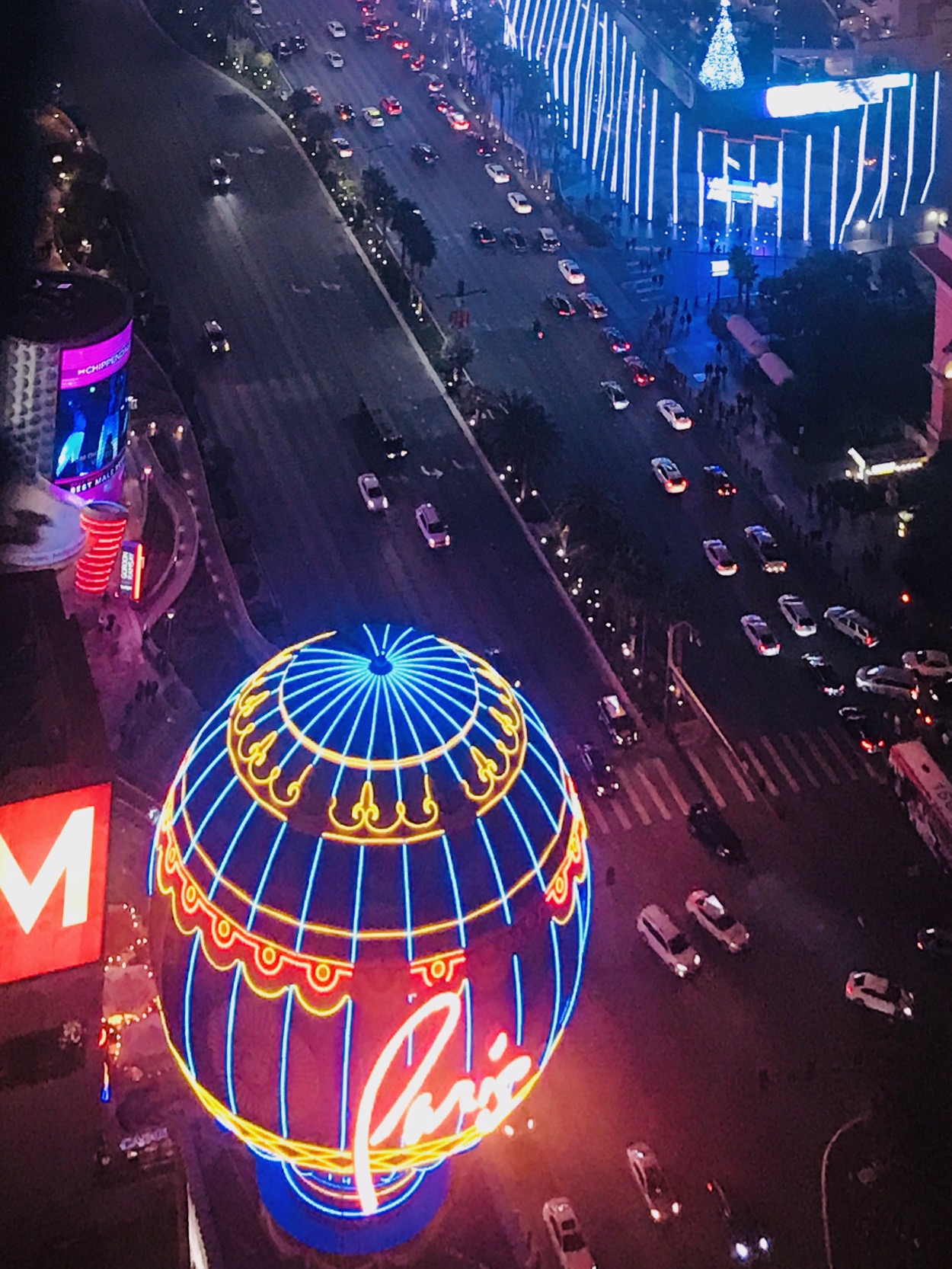 Nightlife Along The Las Vegas Strip In Front Of The Paris Casino Picture  Shows Th Paris Balloon And The Eiffel Tower Replica Which Is About Half The  Size Of The Original In