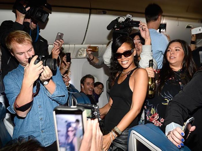 Rihanna on the 777 plane