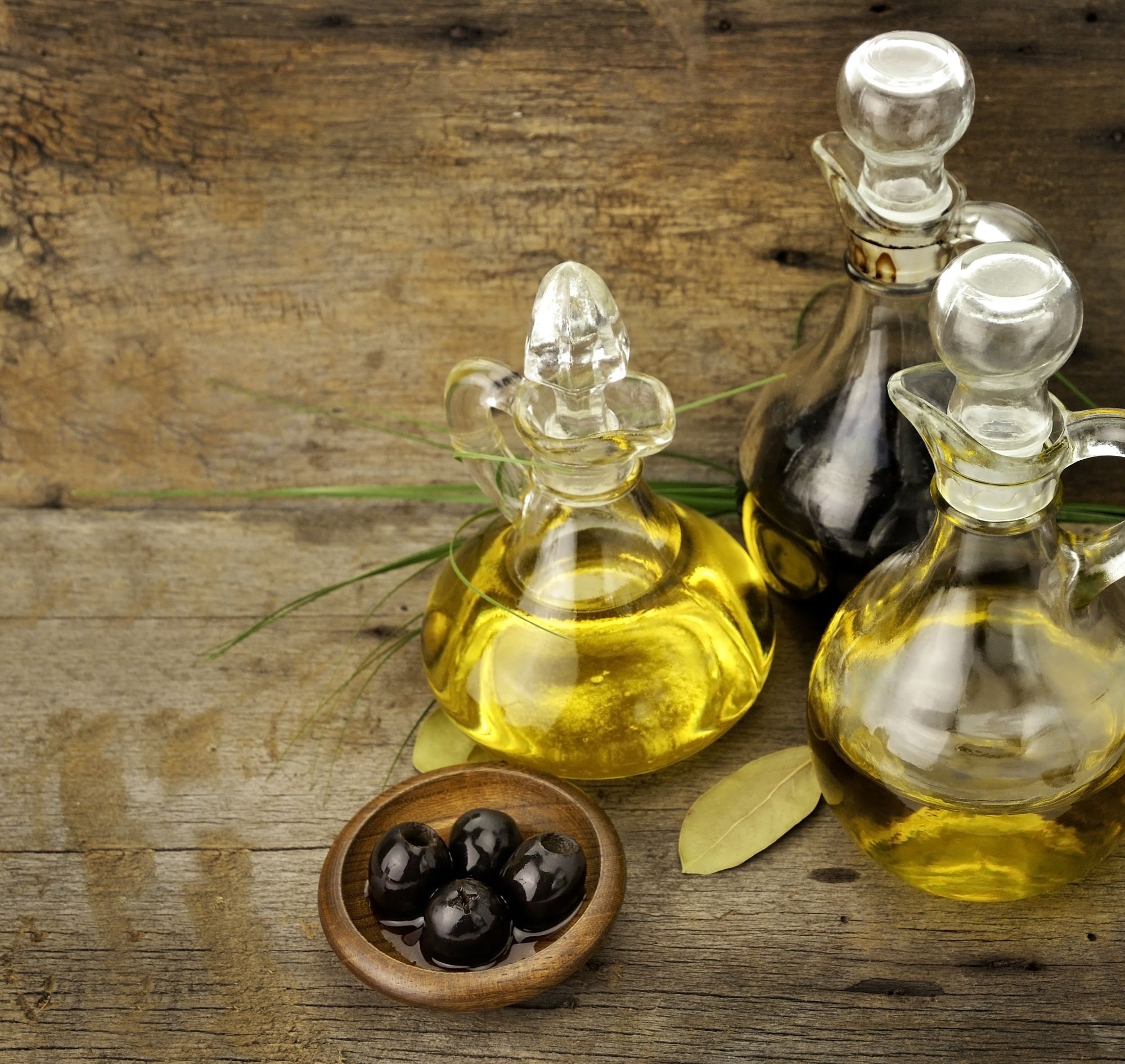 olive oil bottle and olives